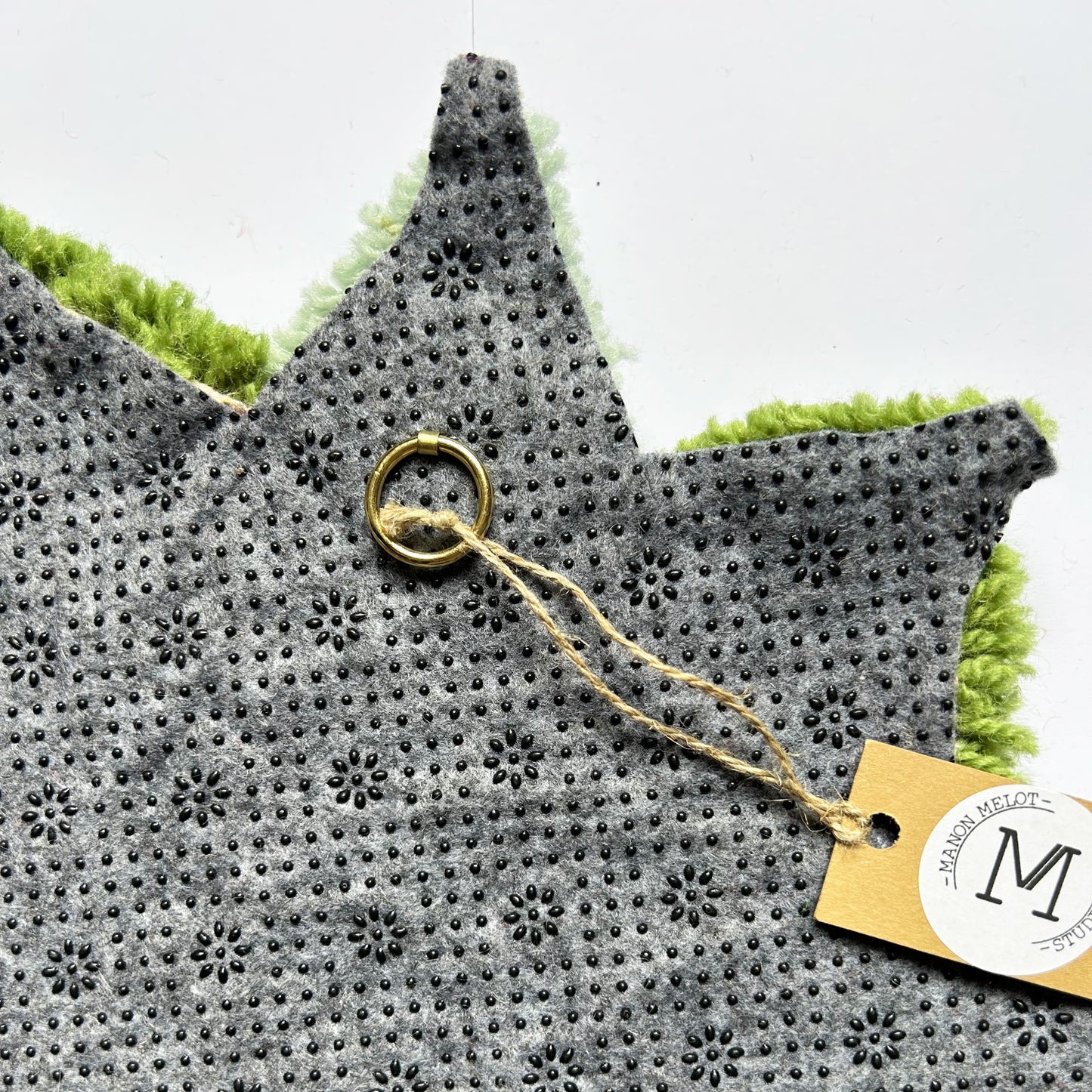 Fleur mandala verte en tufting.