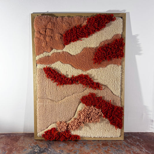 Tableau en tufting orange, pêche, beige.