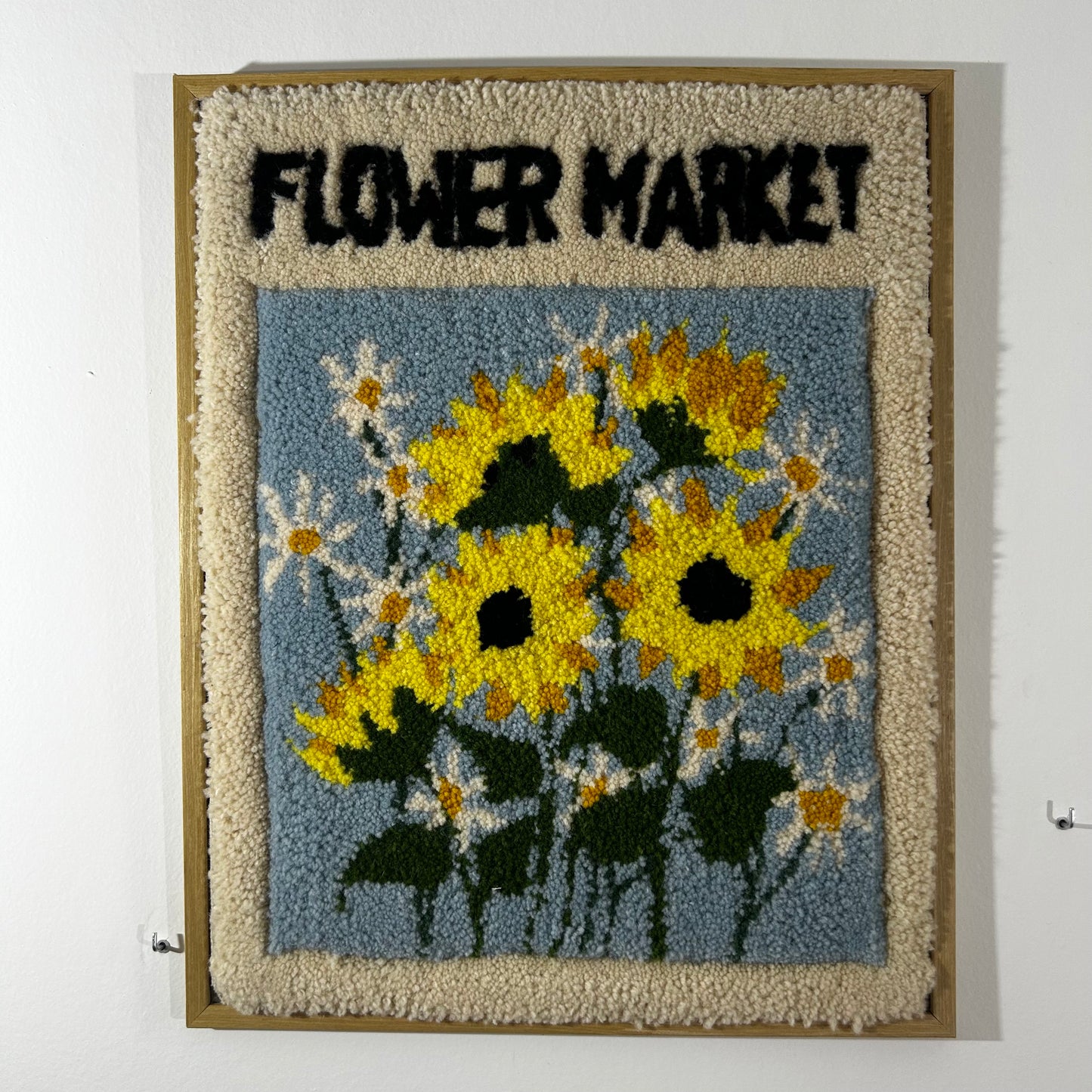 Tableau floral en tufting.